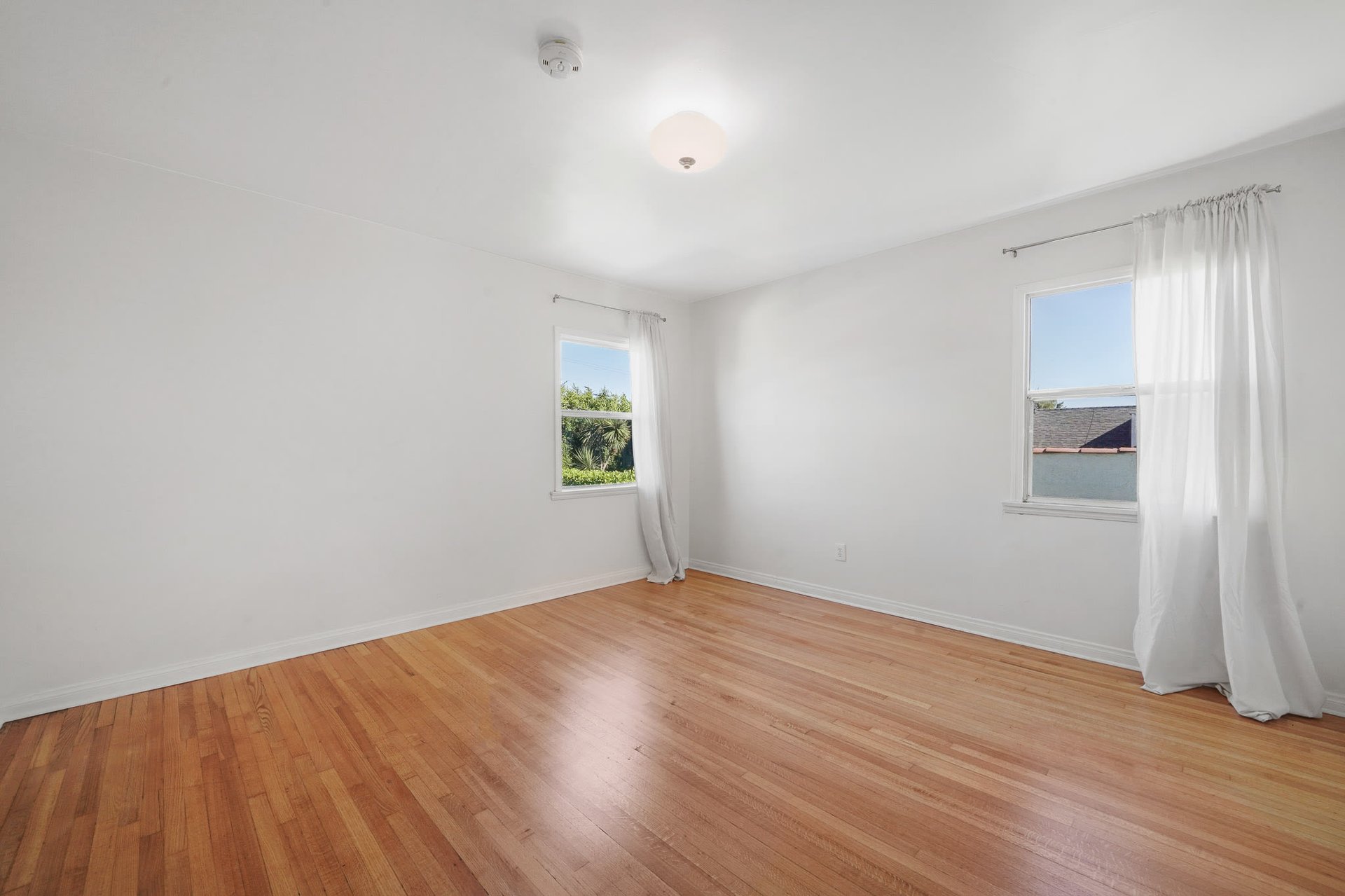 Exquisite Spanish Revival Duplex in Picfair Village!