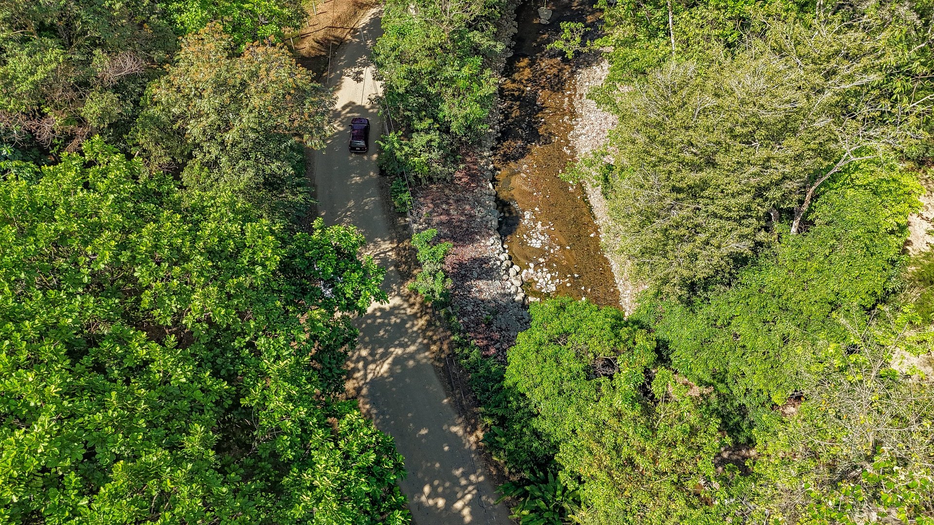 Elevated 2.2 Acres Jungle And Creek-Fronting Mountain View Lot In Ojochal