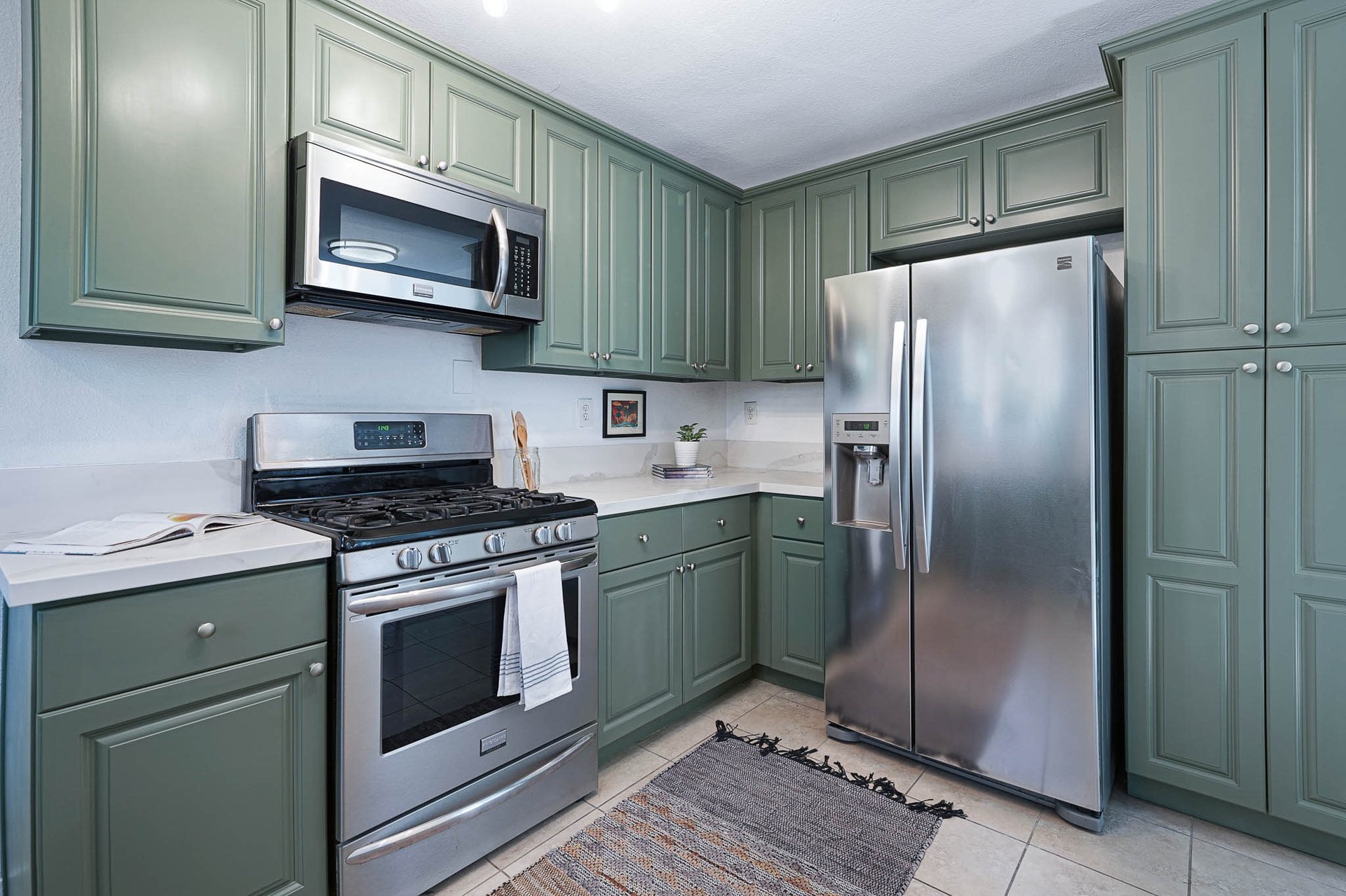 Light & Bright East Coast Traditional Home with Exterior Office & Bonus $2400/mos Rental Unit Above Garage -  in coveted Miracle Mile South!