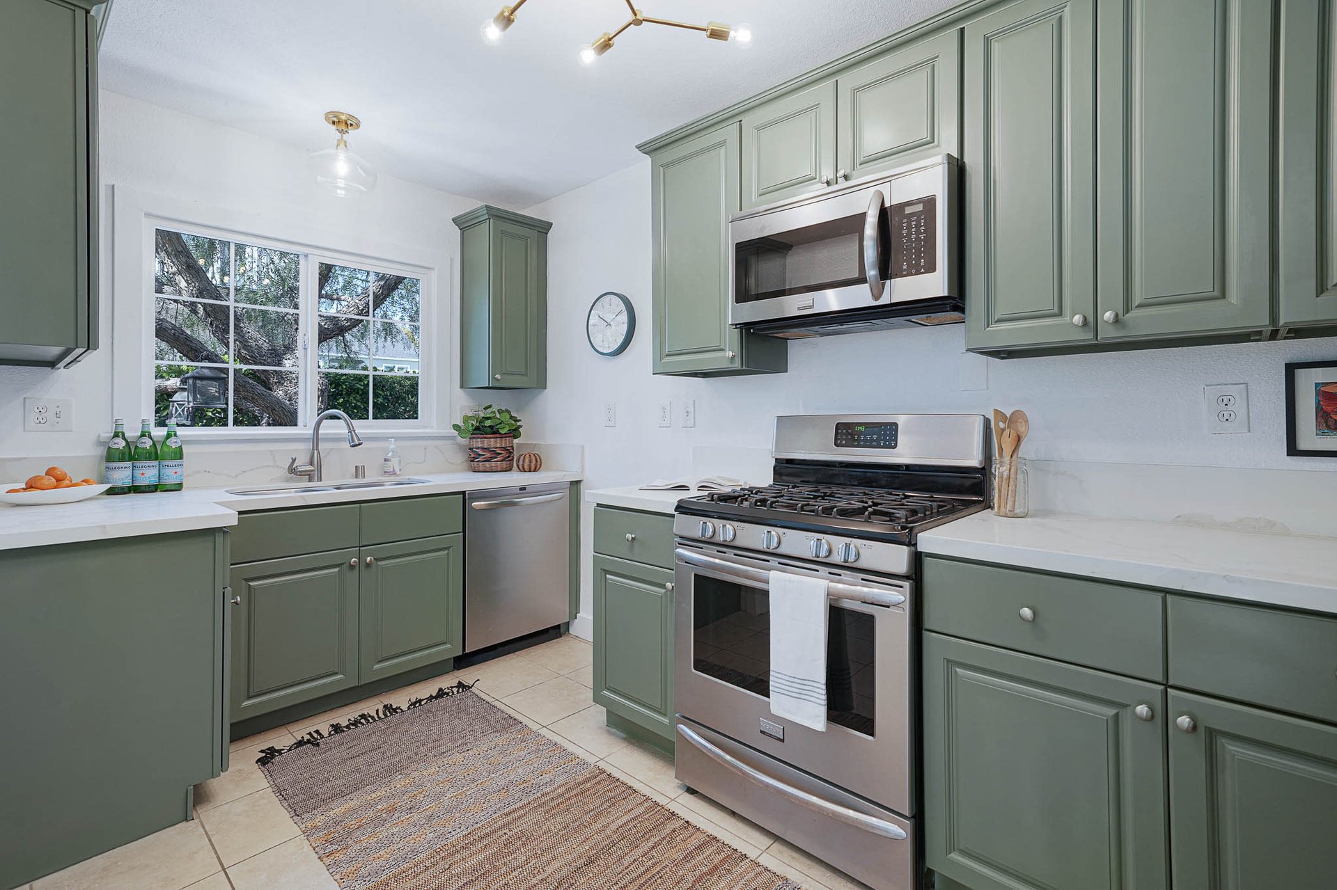 Light & Bright East Coast Traditional Home with Exterior Office & Bonus $2400/mos Rental Unit Above Garage -  in coveted Miracle Mile South!