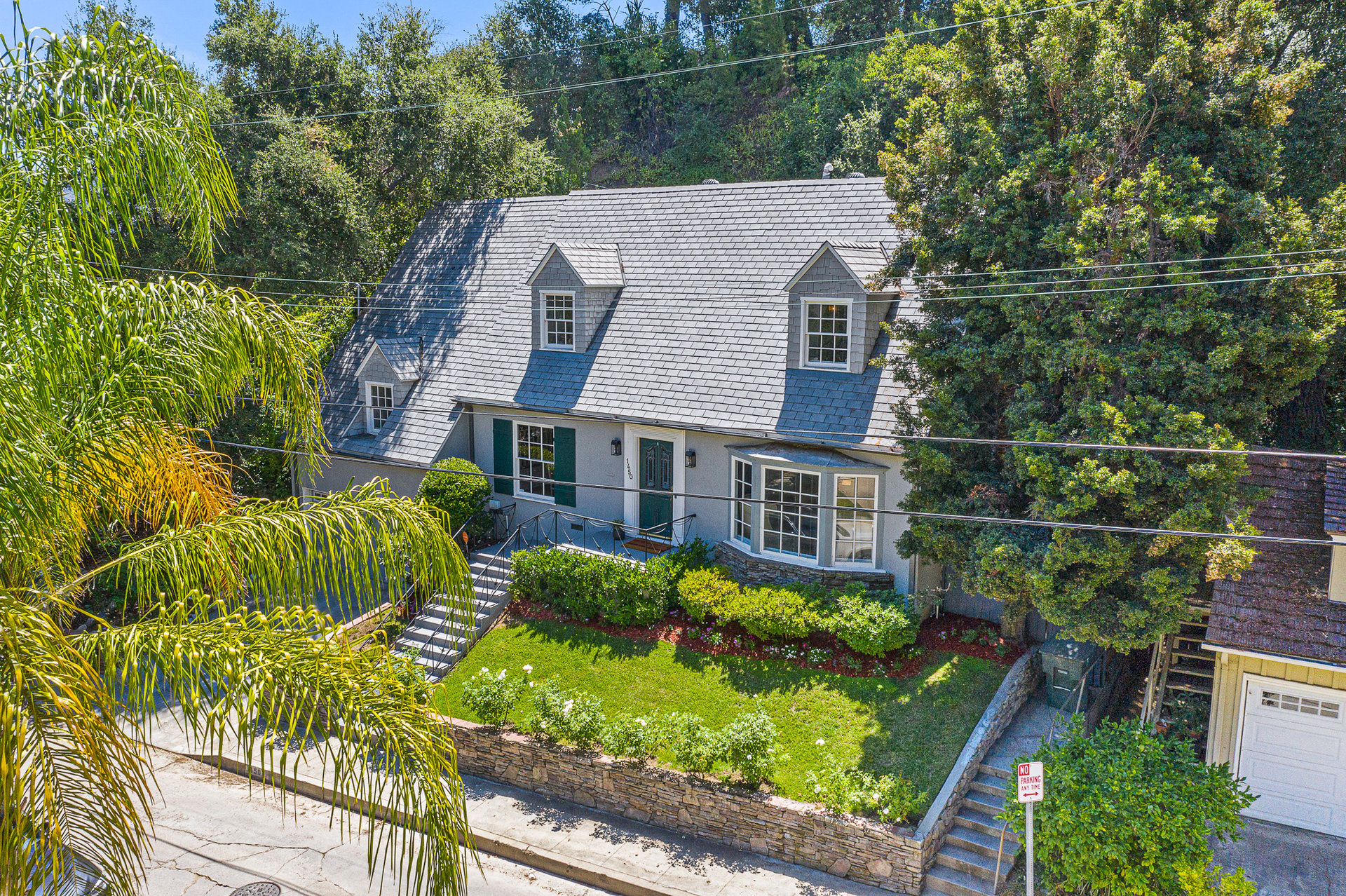 BEAUTIFULLY RESTORED, STORYBOOK CAPE COD HOME IN PRIME VERDUGO WOODLANDS.