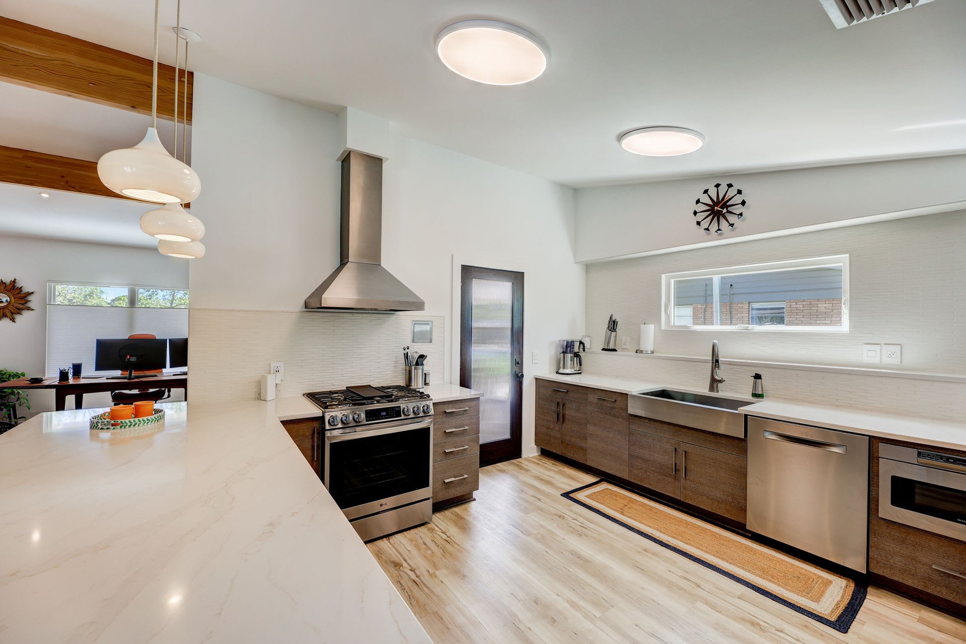 Stunning modern mid-century rebuilt home in the sought-after Delwood Heights near Mueller!