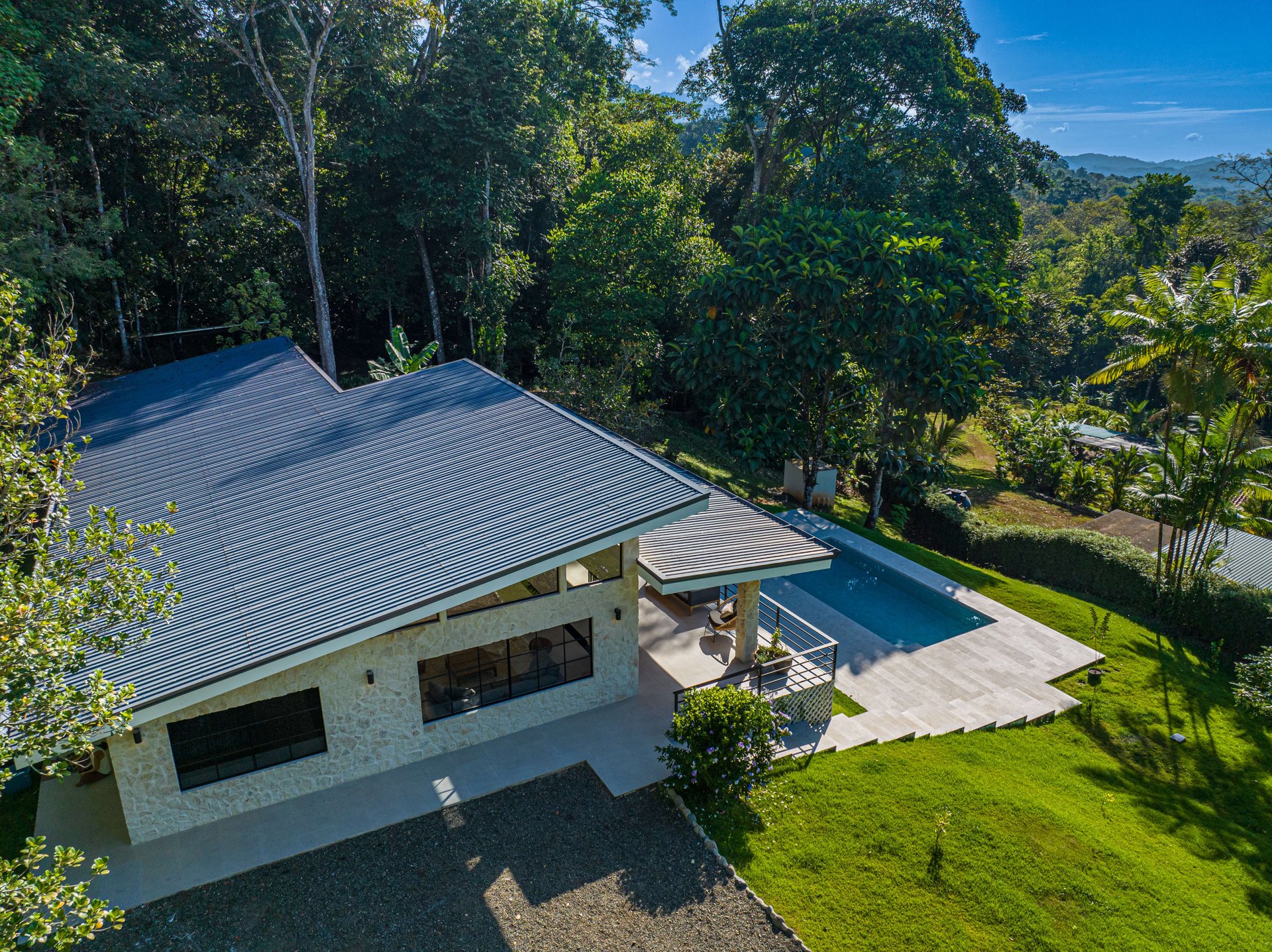 MOVE-IN READY OCEAN VIEW HOME IN CINCO VENTANAS WITH MAJESTIC RIVER ACCESS