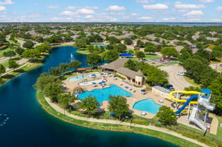 9217 Inverness in Rowlett, TX is part of the Waterview community with a private waterpark, tennis courts, fishing lakes and the Waterview Golf Course.