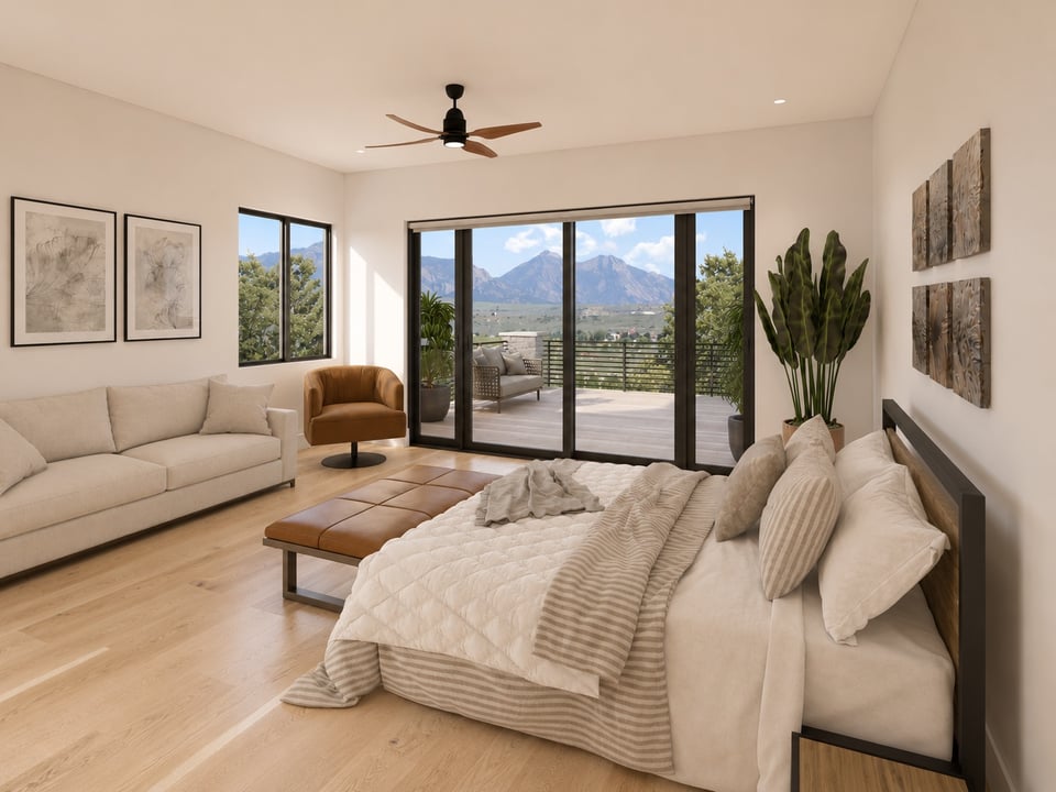 Bedroom with a king bed and sliding doors opening to a mountain-view balcony.