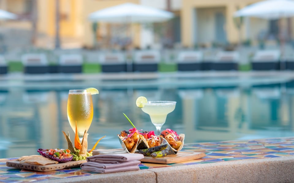 Cocktails and appetizers beside the infinity pool at Quivira