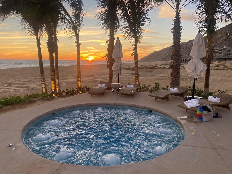 Beachfront hot tub at the Quivira beach club at sunset