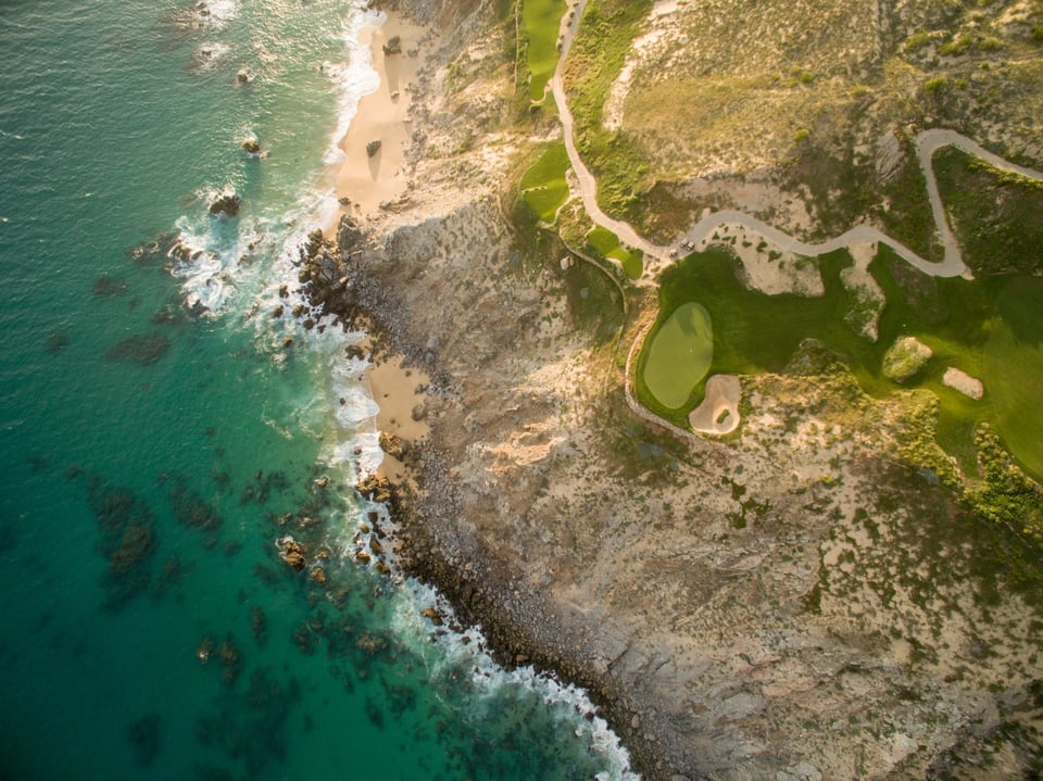 Aerial view of a Quivira golf hole on the Pacific coastline in Cabo San Lucas