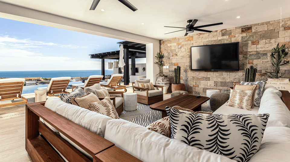 Coronado living room opening to an ocean-view terrace