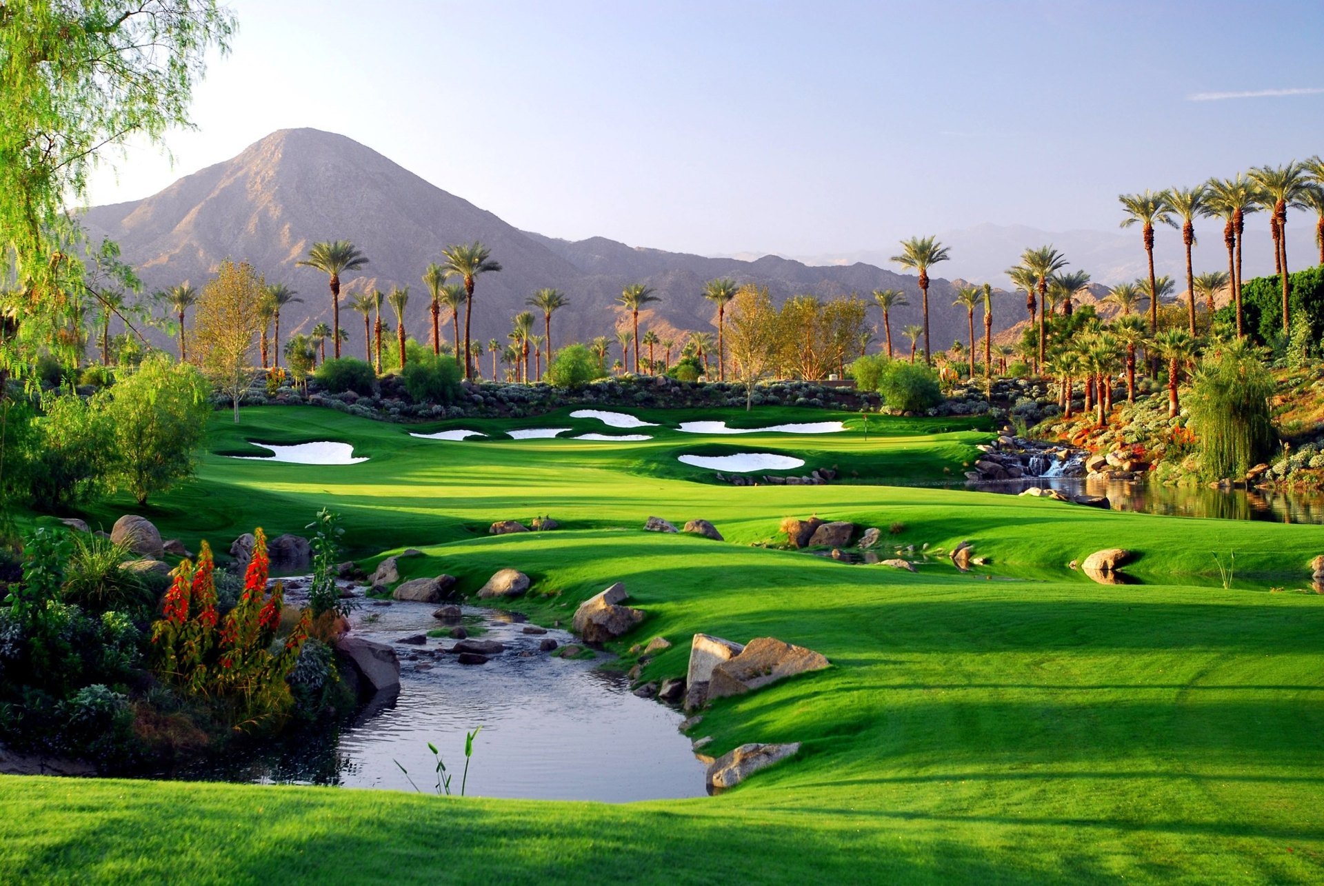 Celebrity Course fairway, bridge and palms at Indian Wells Golf Resort