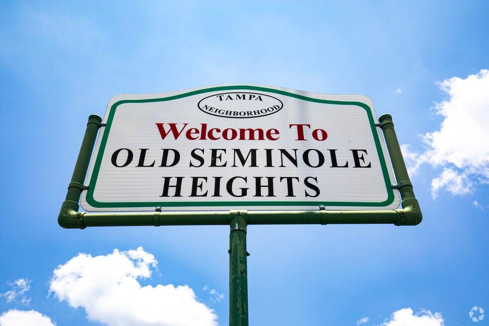 Historic bungalow homes and mature trees showcasing the distinctive character of Seminole Heights in Tampa, Florida.