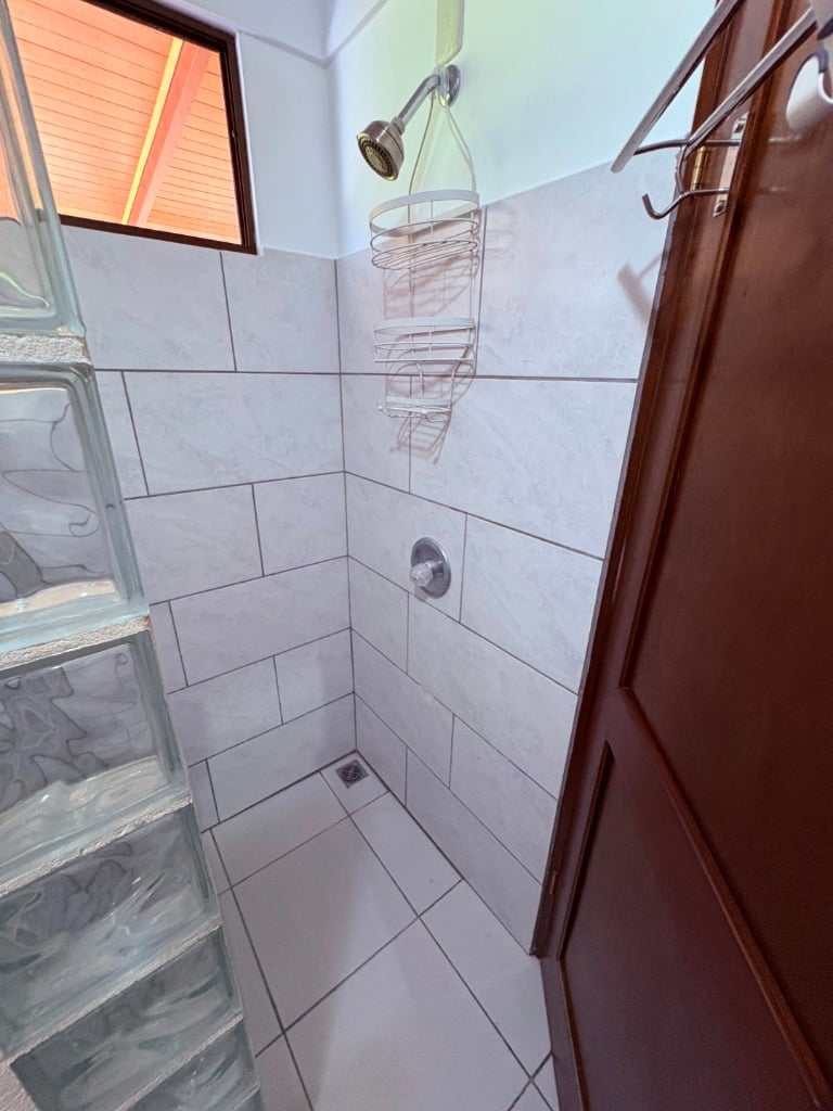 Move in ready 2 bedroom / 2 bathroom home with window ocean view and pool in Ojochal.