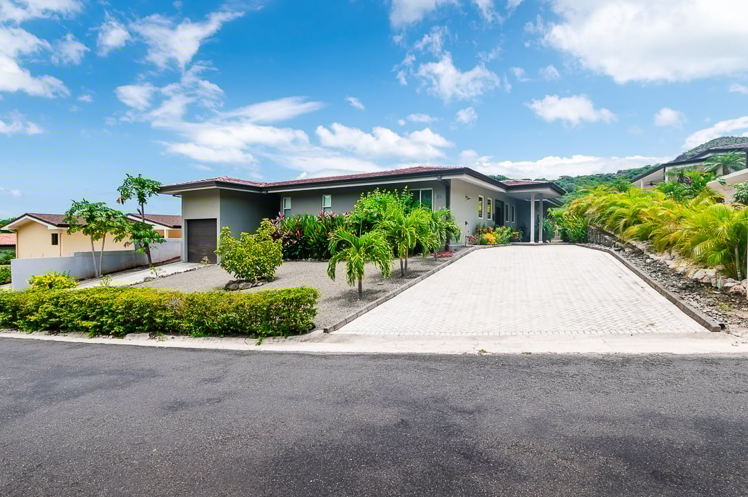 Casa Coralina | Elegant Home in Top Gated Community with Private Pool, Lush Gardens, & Incredible Amenities.  Located on a Double Lot w/ Ocean View!