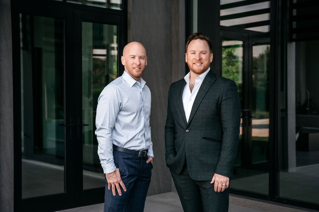 Brian and Jason Knox outside a modern Naples residence