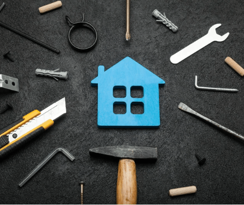 Blue house-shaped symbol surrounded by home repair tools.