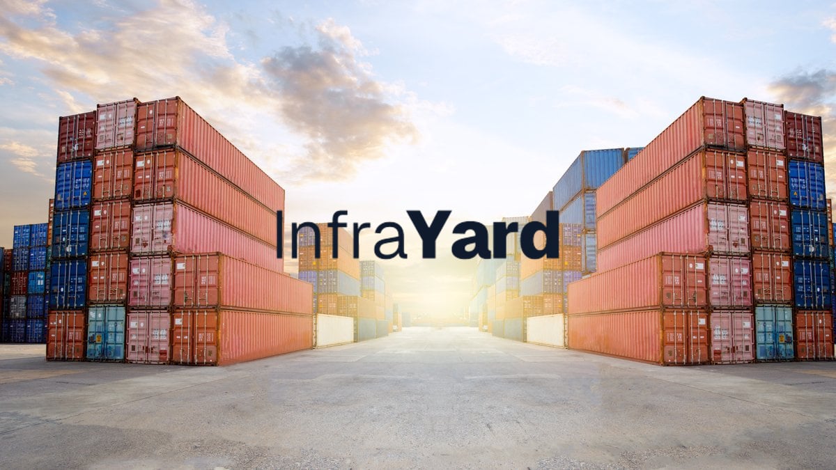 Industrial shipping-container yard with stacked red and blue containers and the InfraYard wordmark.