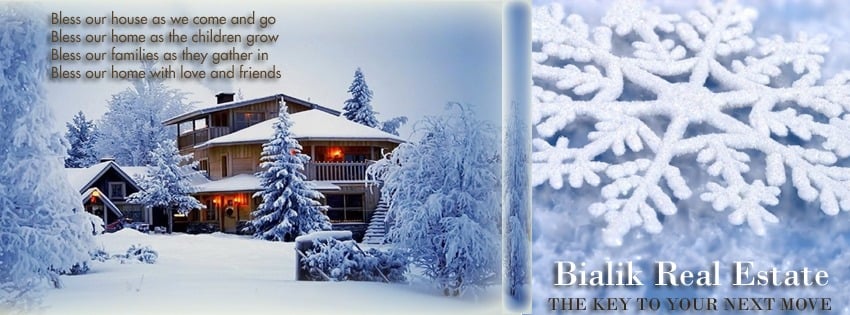 Bialik Real Estate winter banner with a snow-covered home, a house blessing, and the tagline “The Key to Your Next Move.”