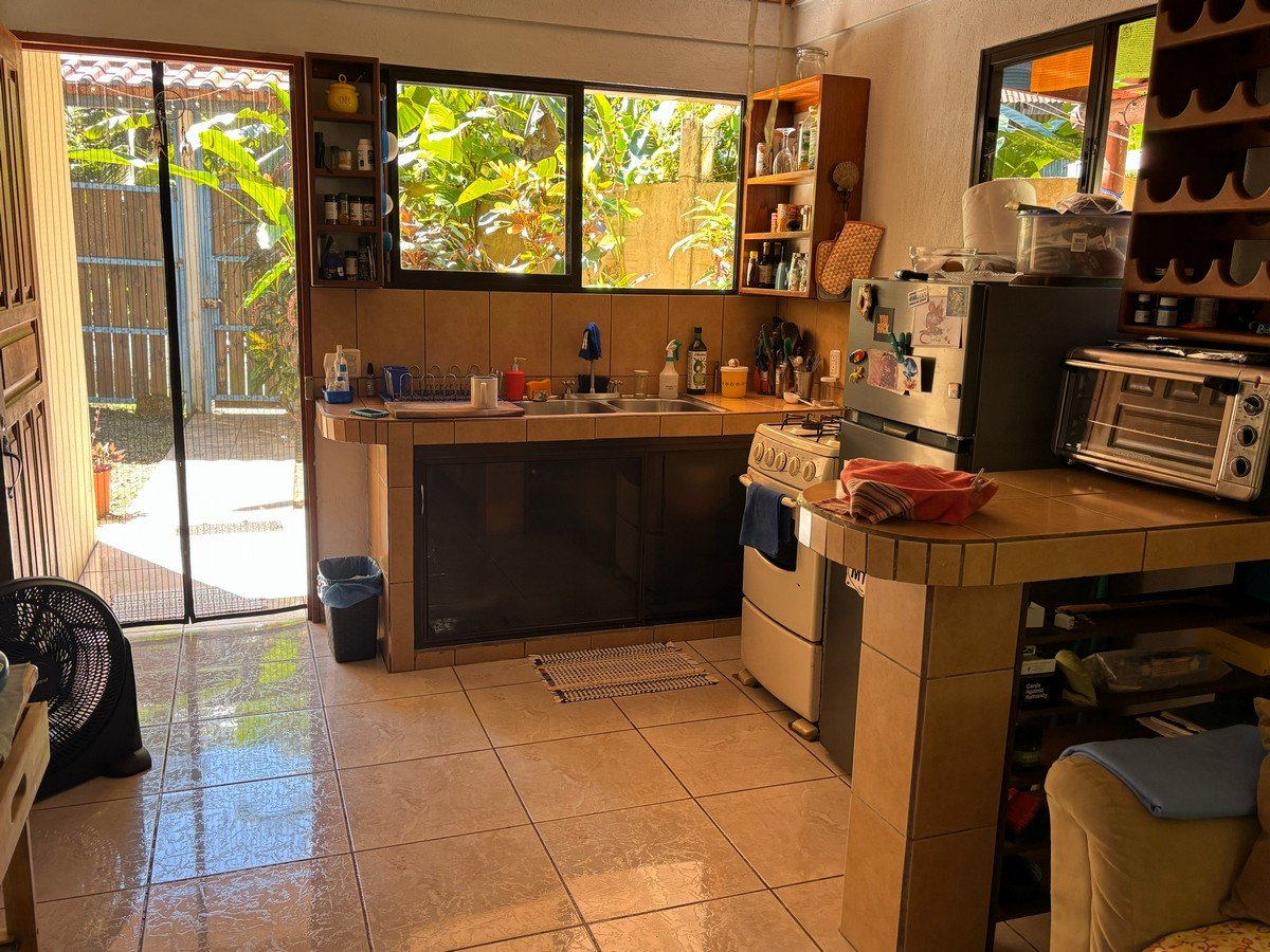 0.16 Acres – 4 Living Units, 7 Bedroom Riverfront Investment Package Near Dominical Beach With Owner Financing!!!