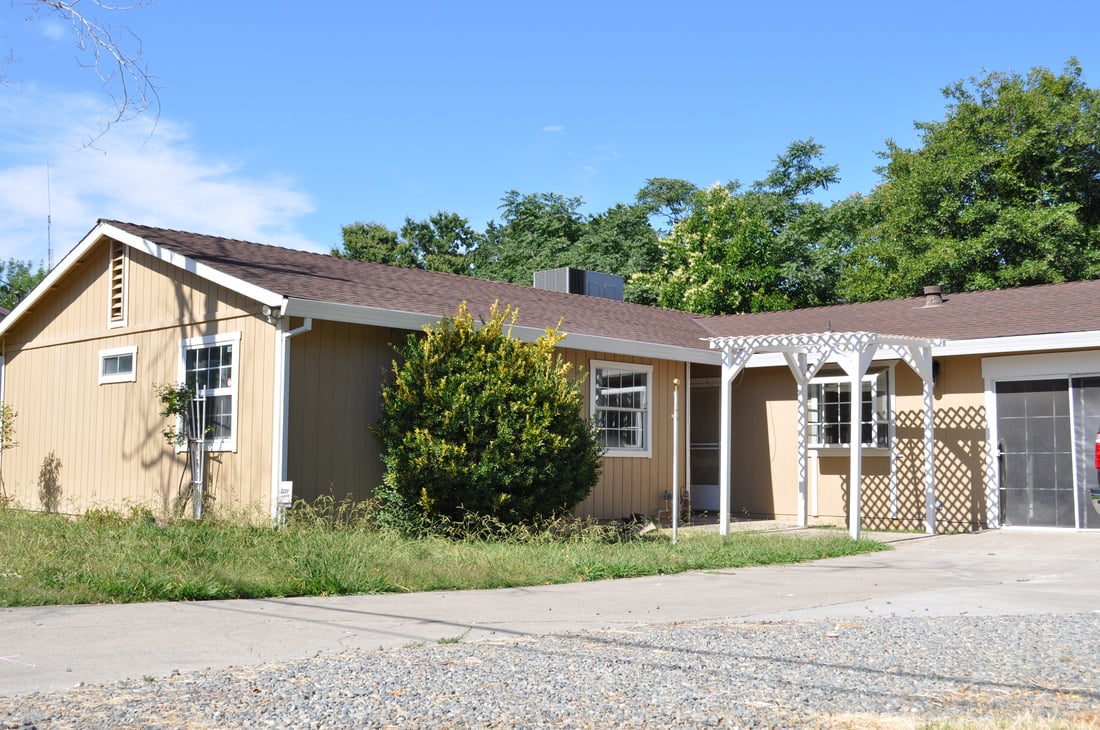 Large Lot, Spacious Home, and A Giant Workshop! Unique Opportunity.