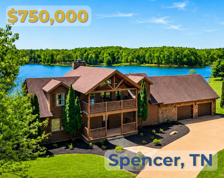 Lakefront timber-style home with a two-story covered porch and attached garage.