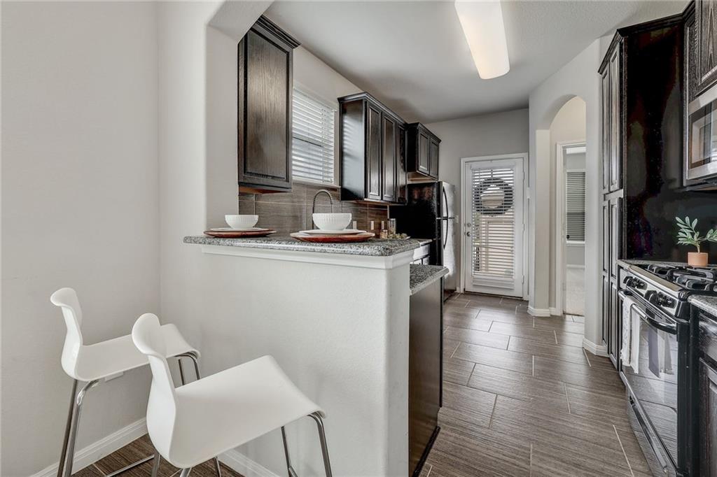 Modern Corner Lot Townhome in Coveted Carrington Court!