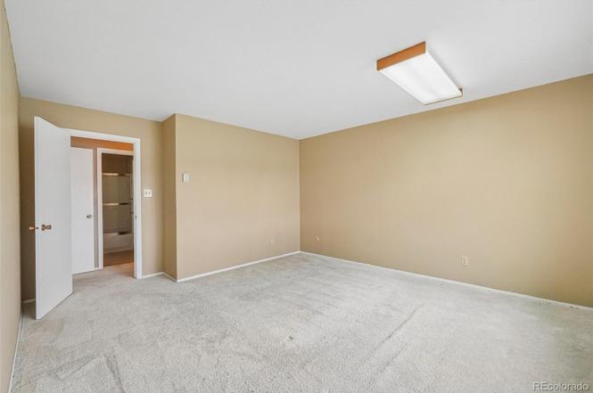 Lake Woodmoor Investor Special – Rare 1-Bed Lakeside Townhome with Huge Upside