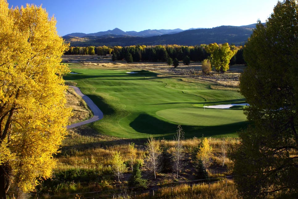 Aerial view of luxury homes at 3 Creek Ranch in Jackson Hole, featuring stunning Teton Mountain views, private Rees Jones golf course, and pristine spring-fed streams for fly fishing.