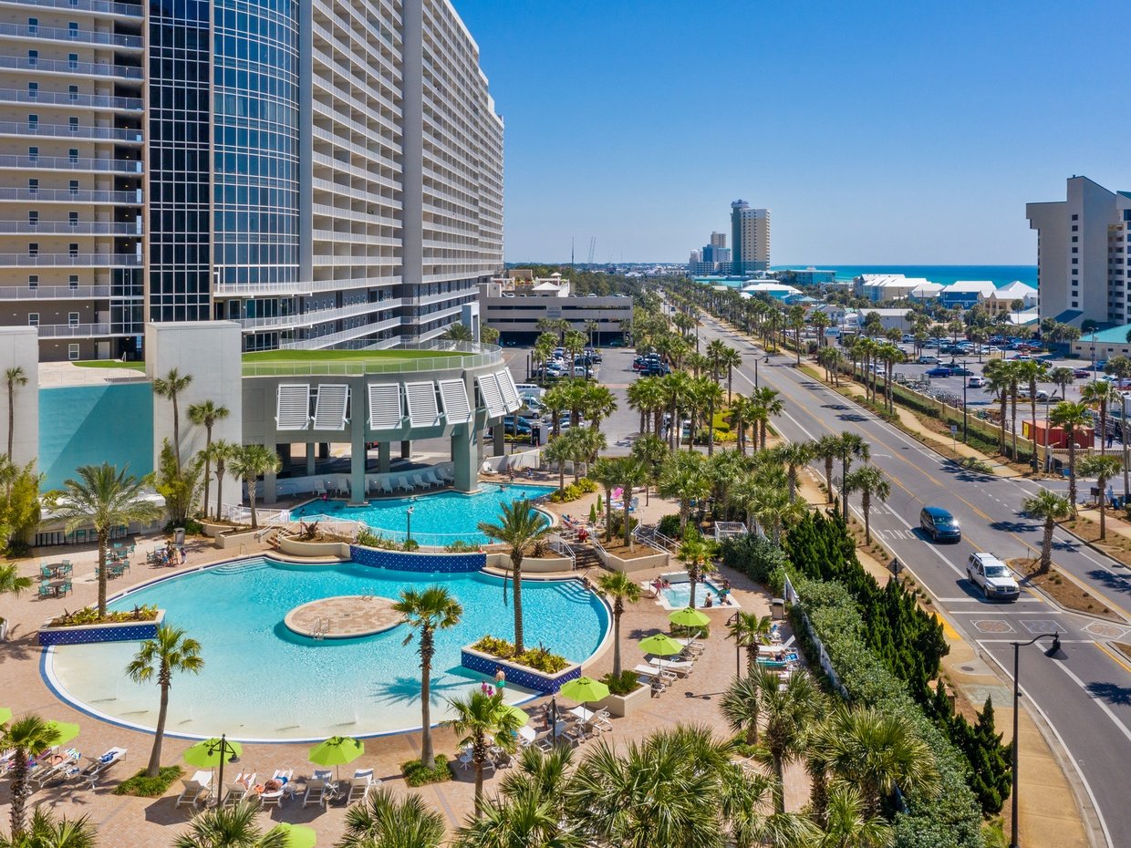 Laketown Wharf Resort pool and condominium tower near the Gulf of Mexico in Panama City Beach Florida