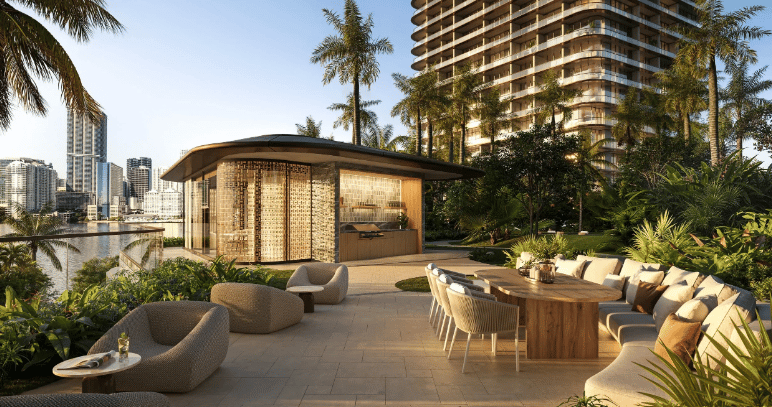 Landscaped high-rise terrace with dining table, lounge seating, palm trees, and skyline views.