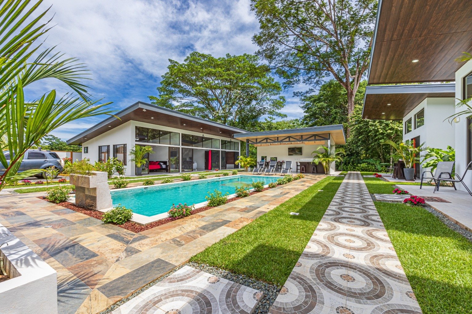 Incredible turnkey investment opportunity, 3 Rental villas, and a 2 Bedroom Home with a large pool.
