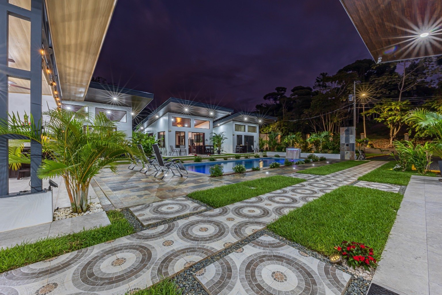 Incredible turnkey investment opportunity, 3 Rental villas, and a 2 Bedroom Home with a large pool.