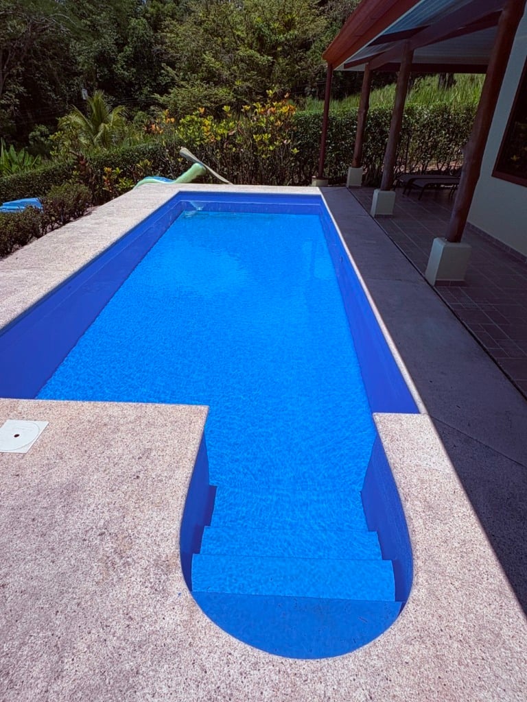 Move in ready 2 bedroom / 2 bathroom home with window ocean view and pool in Ojochal.