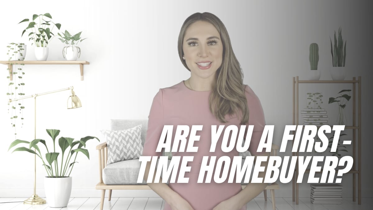 Banner asks, “Are you a first-time homebuyer?” beside a smiling woman in a bright living room.