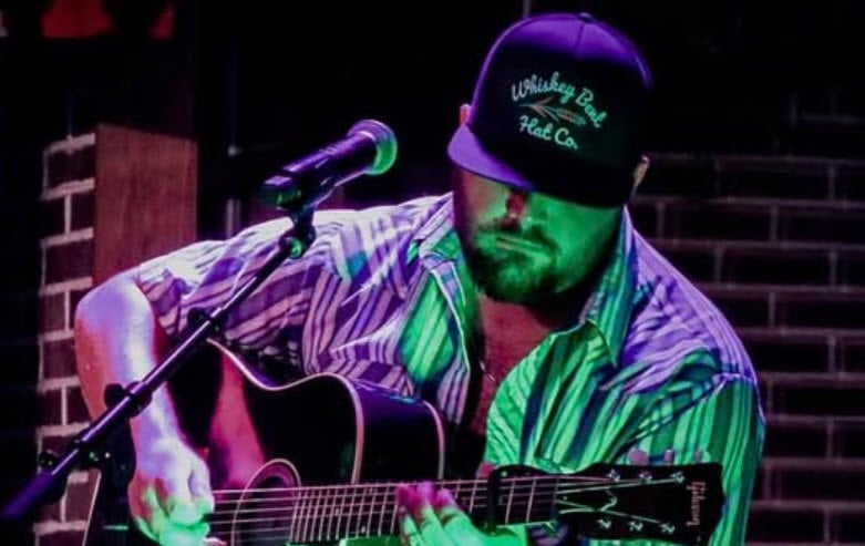 CHip Perry band playing music on stage they will be featured at the Sweet Carolina Music Festival sponsored by Vignette Realty