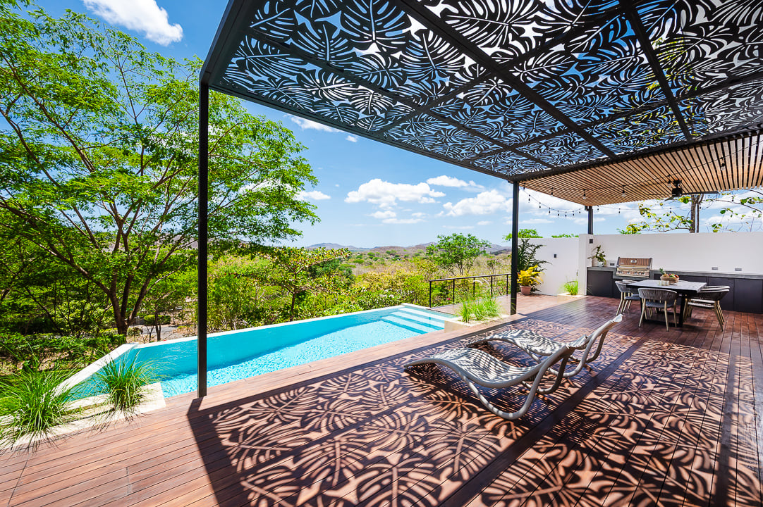 Casa Kalachuchi | Gorgeous Modern Jungle Oasis with Sunset Views in Gated Community