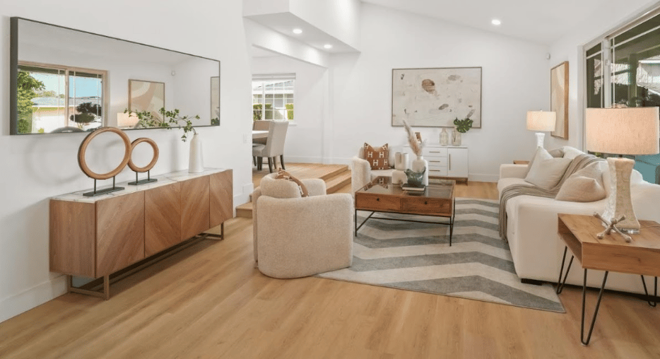 Beautiful hard wood flooring in an open concept luxury home.