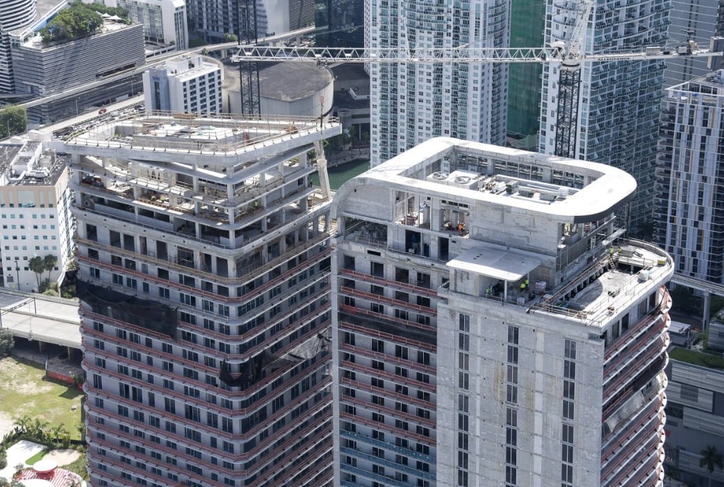 Newgard Group and Two Roads Development Mark Major Construction Milestone at One Brickell Riverfront With Installation of Architectural Crowns