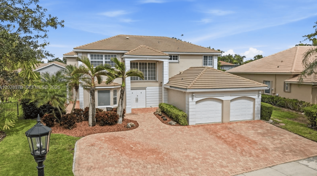 A Rare Multigenerational Home with a Private Residence in Weston Hills Country Club