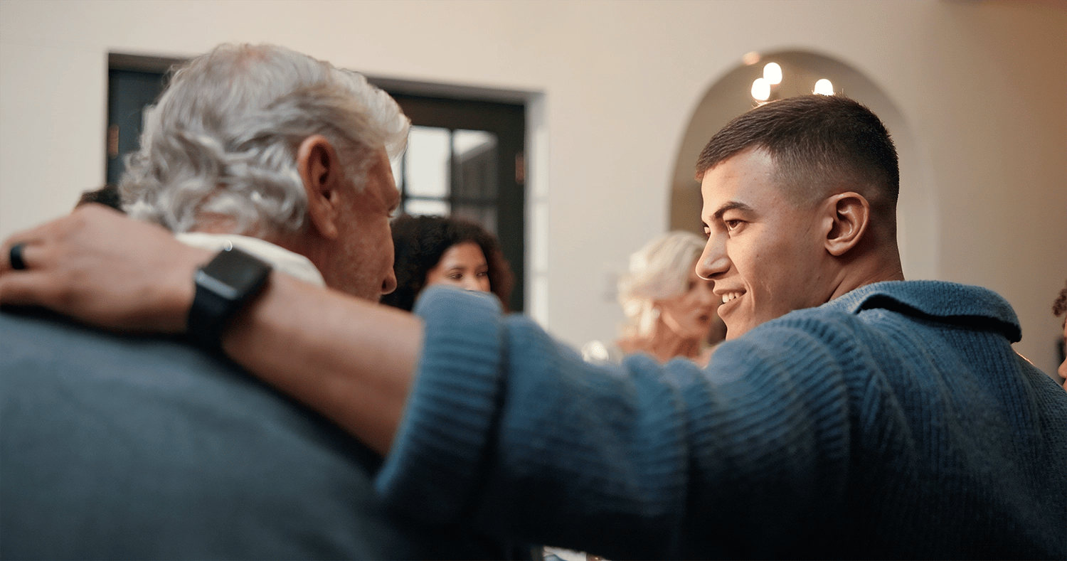 son and father at dining table