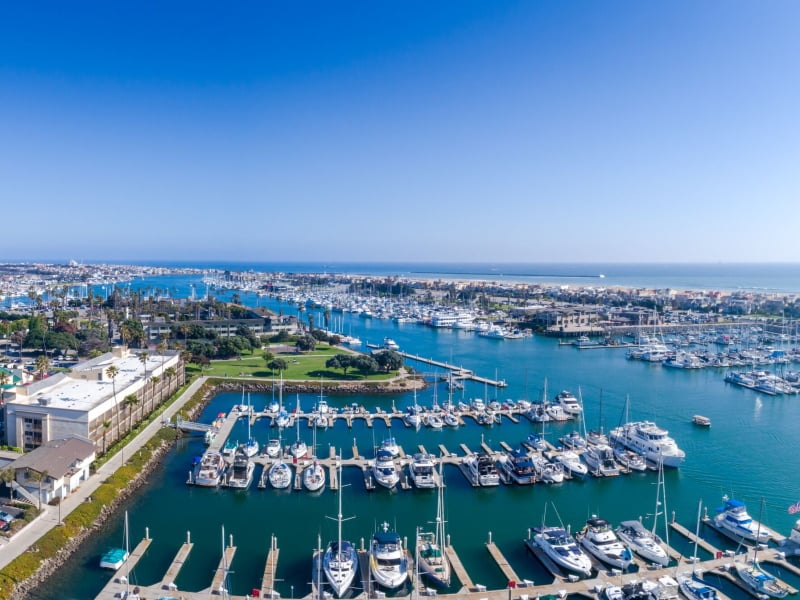Aerial view of single-family homes with private boat docks along the salt-water canals in Mandalay Bay Oxnard
