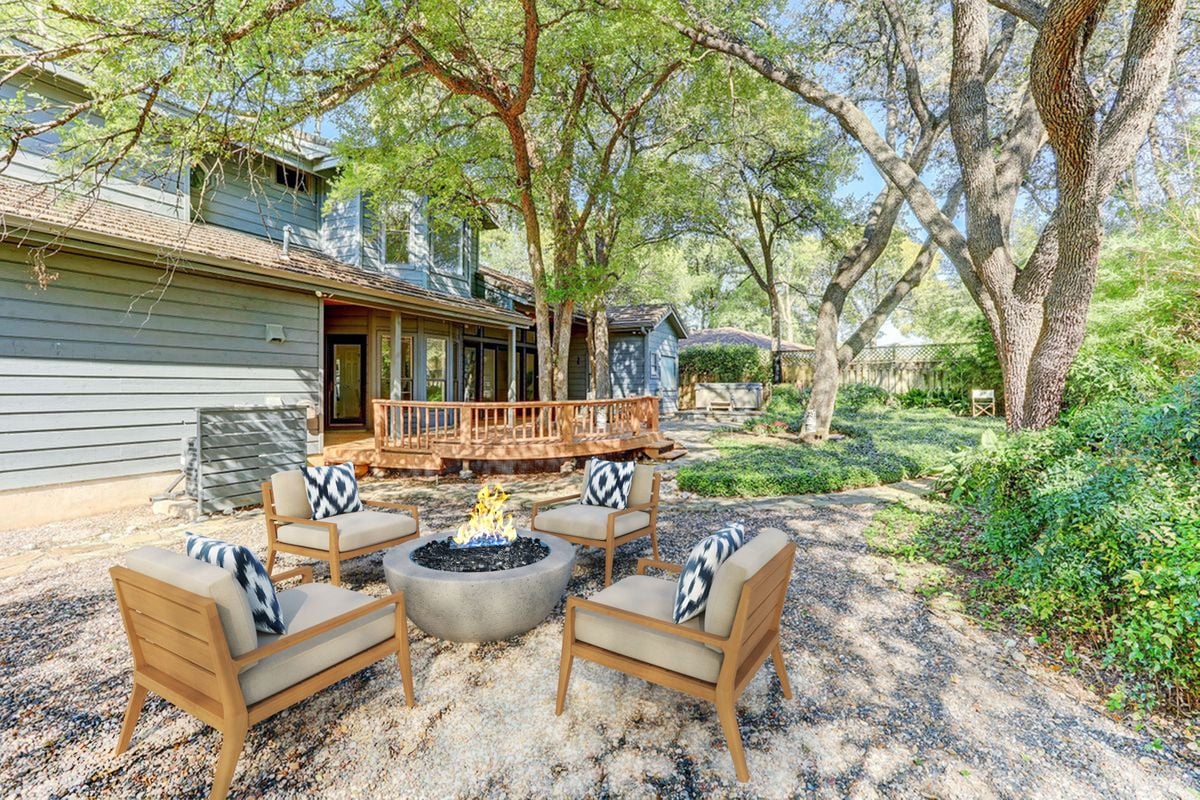 Backyard fire pit lounge area at 2131 Barton Hills Drive, Austin, TX 78704, with lounge seating 