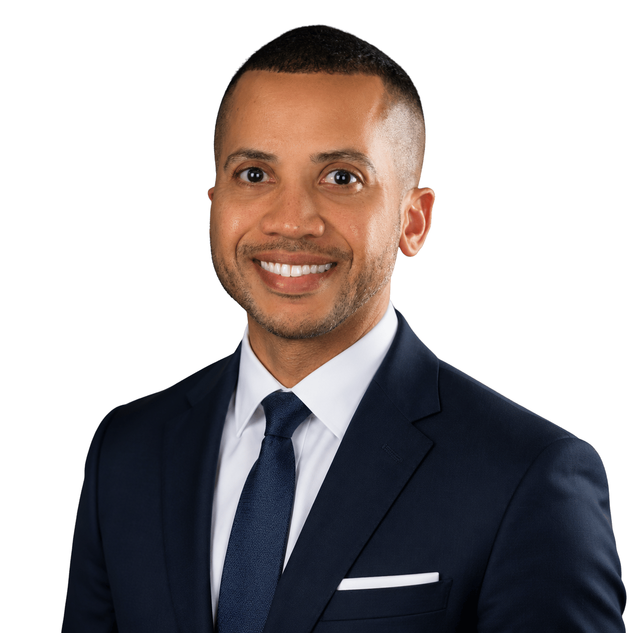Daniel Gray, smiling in a navy suit and dark tie