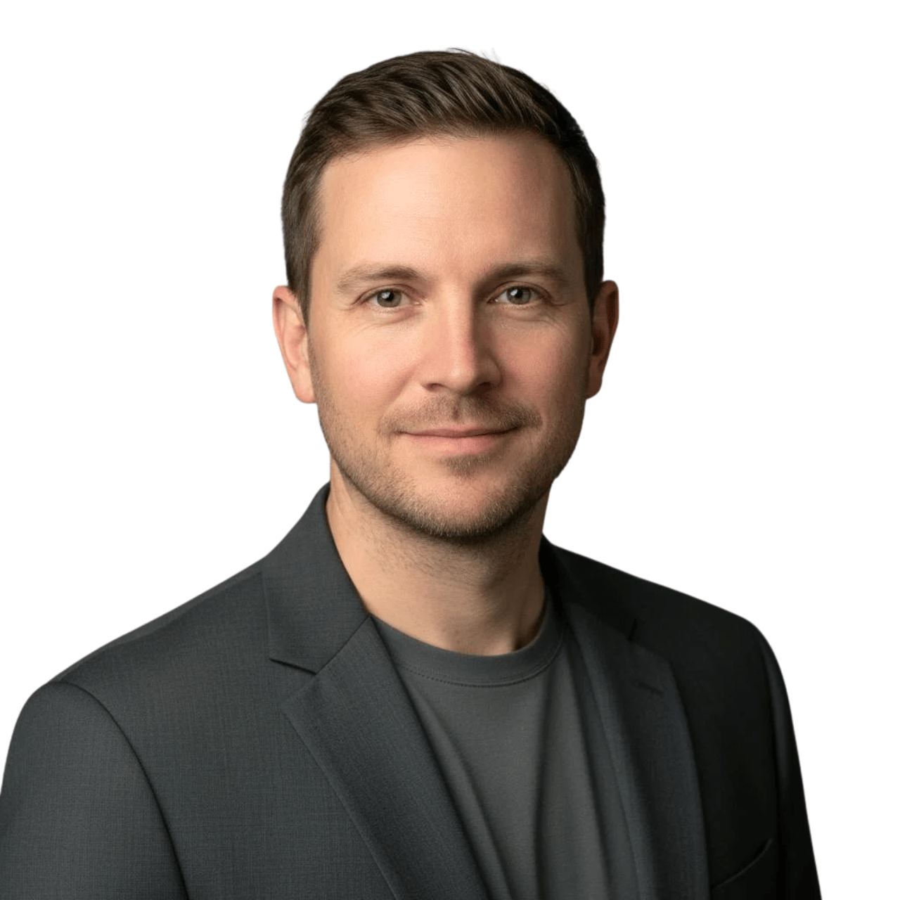 Daniel Brown wearing a charcoal blazer and gray shirt.