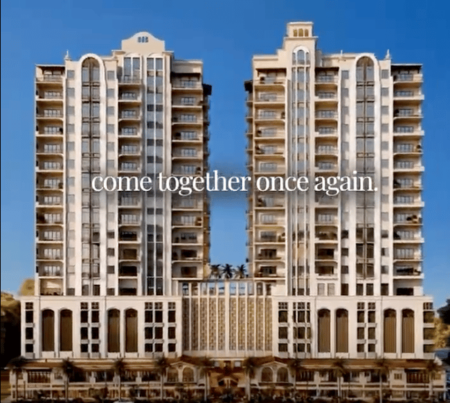 Mira Mar Residences twin towers with balconies, ornate facades, and street-level commercial space.
