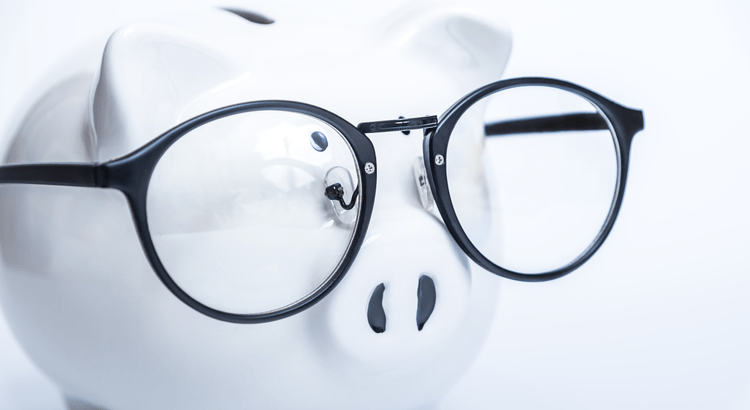 A white piggy bank wearing oversized black glasses, creating a playful and humorous tone. The background is soft white, emphasizing the quirky style.