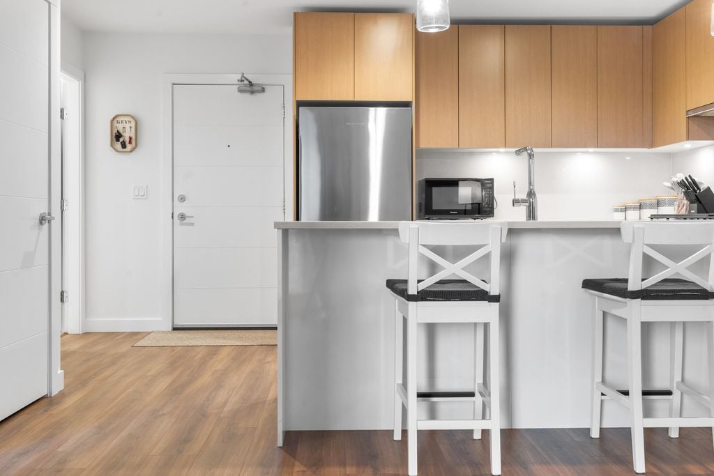 108 E 8th St, #214