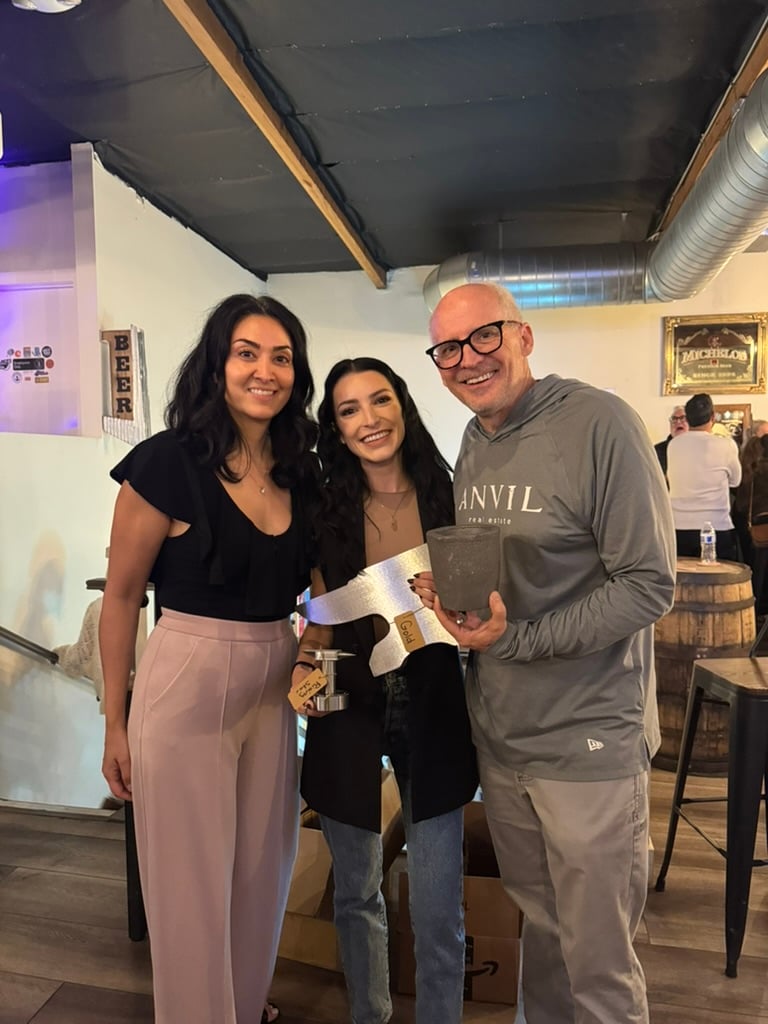 Melody-Smith-and-Dan-Smith-with-Jade-Larney-presenting-awards-top-agent-production