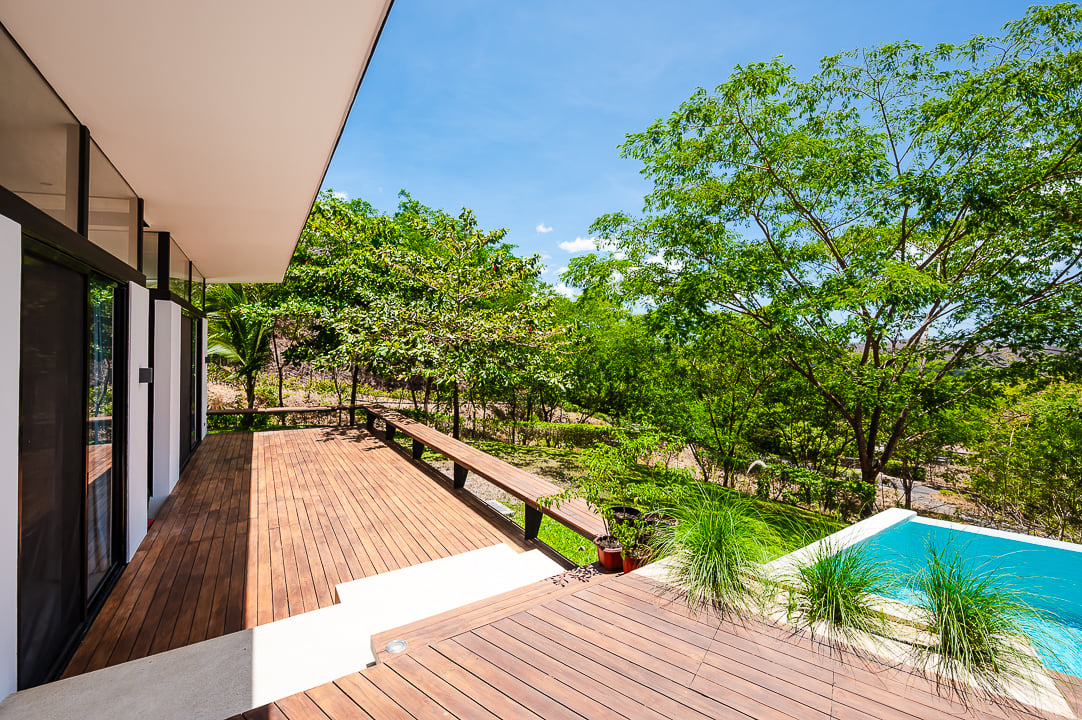 Casa Kalachuchi | Gorgeous Modern Jungle Oasis with Sunset Views in Gated Community