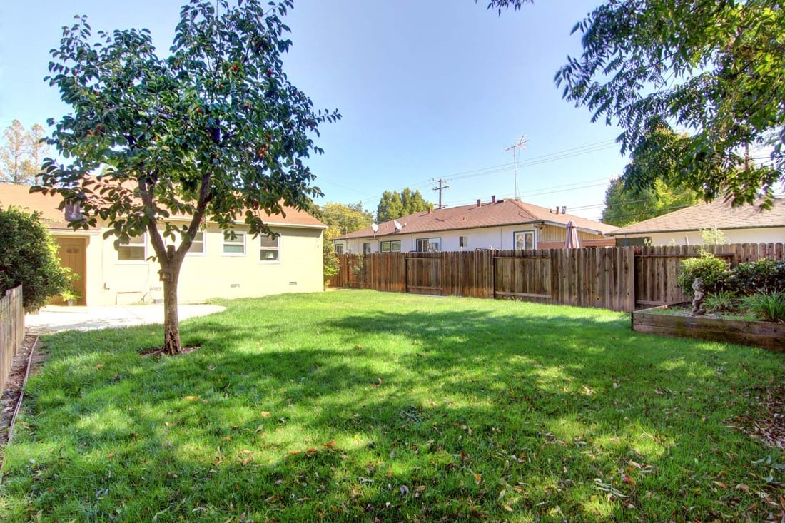 Just Listed! Darling Elmhurst Home with Huge Backyard!