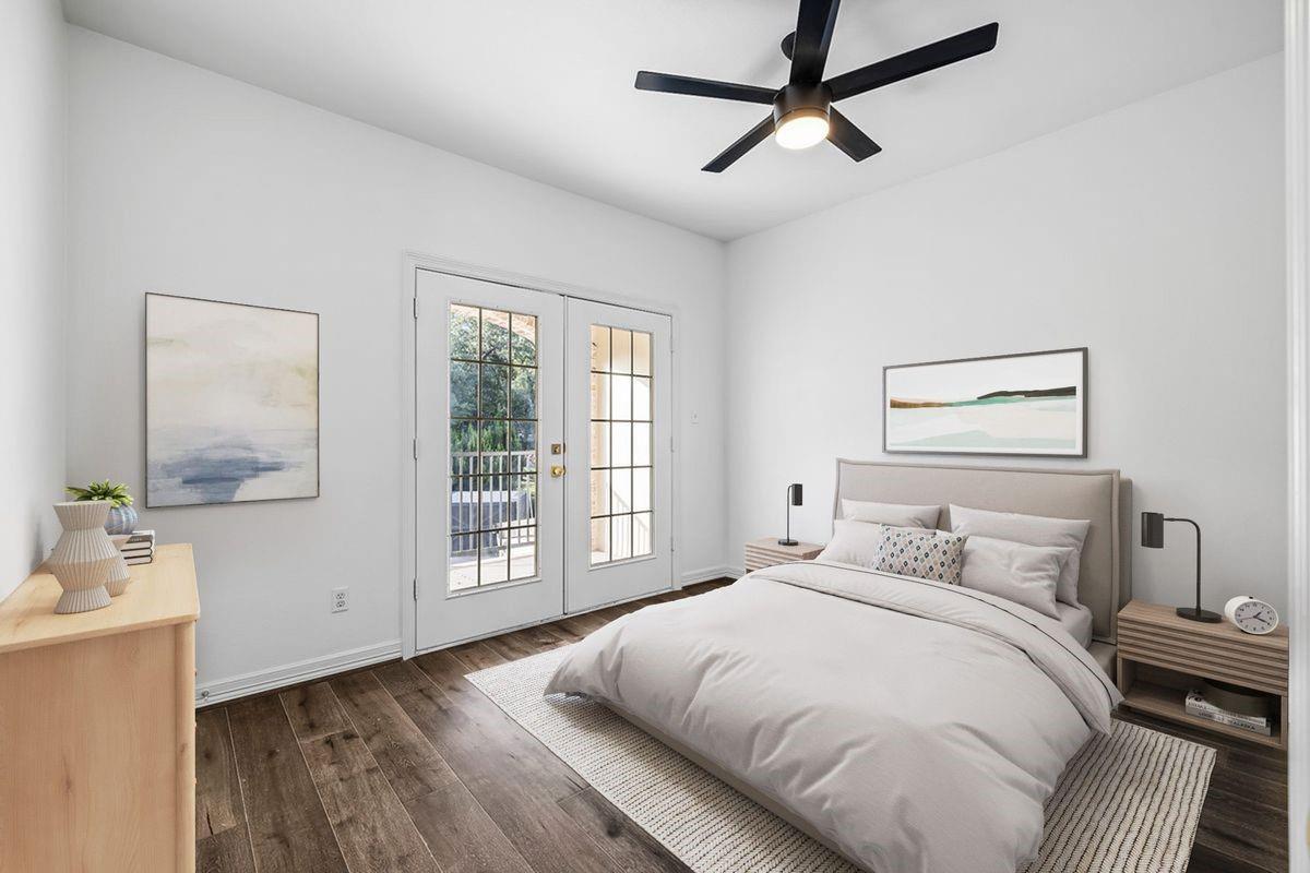 Guest bedroom with French doors to a private balcony, Barton Hollow, Westlake, Austin.